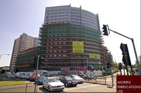 Photo of building under construction with secondary steelwork.
