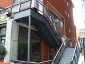 Photo of steel fire escape staircase.