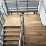 Internal steel staircase with stainless steel balustrade and timber treads