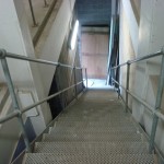 Steel stairs with handrail standards