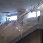 Stainless steel balustrade up stairs and across landing