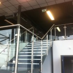 Stainless steel balustrade up stairs and across mezzanine at a gym in Birmingham.