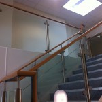 Stainless steel uprights with a beech handrail