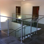Stainless steel balustrade around landing and stairs