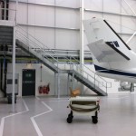 New galvanised steel staircase in airport hangar