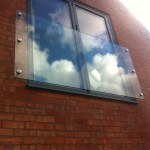Prefixed juliette balcony with 6 no stainless steel glass adaptors