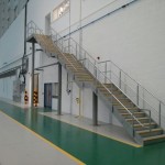 Galvanised steel staircase at airport hangar