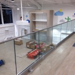 Frameless glass balustrade to mezzanine gallery