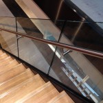 Feature staircase with frameless glass balustrade