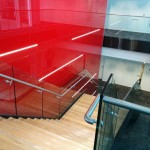Feature steel staircase with frameless glass balustrade in Birmingham