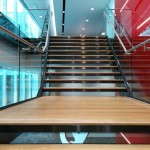 Feature steel staircase with frameless glass balustrade in Birmingham