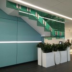 Green tinted frameless glass balustrade to staircase