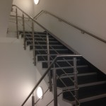Stainless steel running rail balustrade to staircase