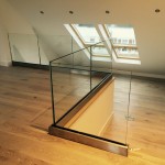 Internal frameless glass balustrade with base fixed U-channel and no top rail